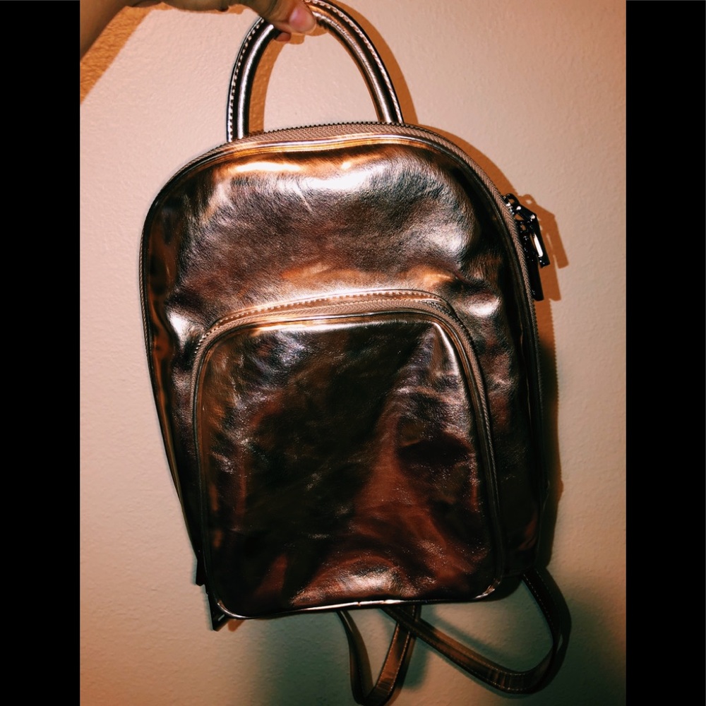 Cute Gold expensive bag/ small backpack Never used